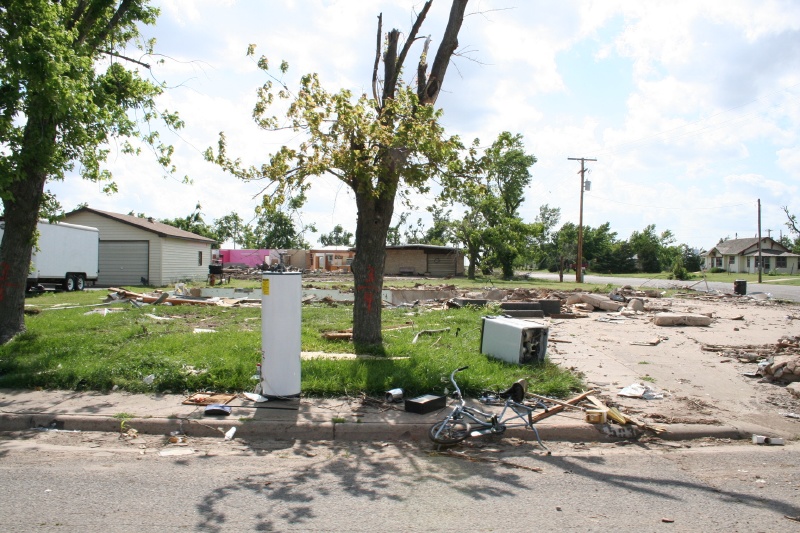 While directly across the street, their neighbor is gone
