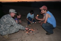Checkpoint - Kids roast marshmellows with Guard