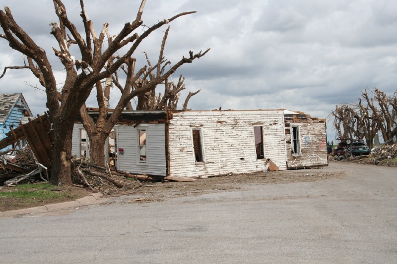This house is in the road - later I think someone adds some red shoes under it