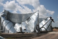 All of us think the bins have collapsed even more, but Ki said this is the way the tornado left them
