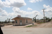 A small model home has been moved in and is open for business.