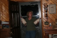Kim feeds the calves.