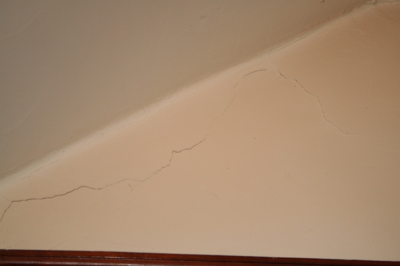 She gives me a tour of the cracks...