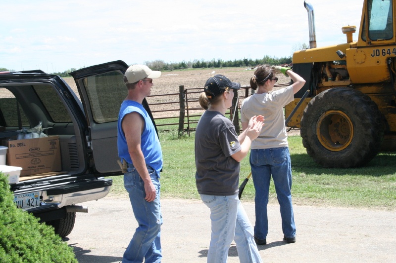 Cheering for the equipment operator.