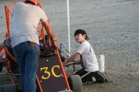 Jacob changes his oil.