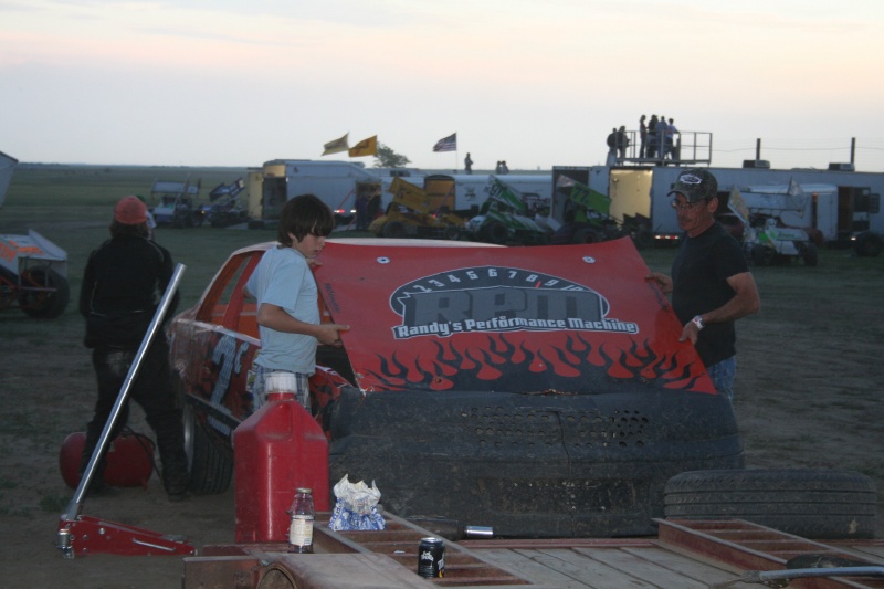 Working on car in pits at WaKeeney