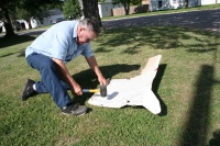 Grandpa helps with repairs after Hays race