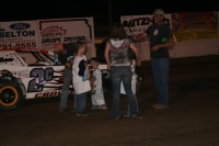 Matthew signing autographs