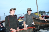 Brothers discussing the race with Dad